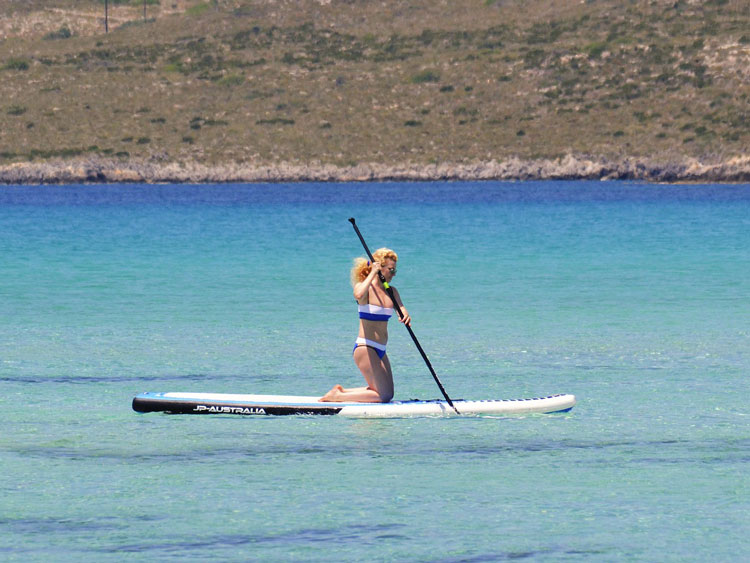 Is paddle boarding hard? You can always kneel