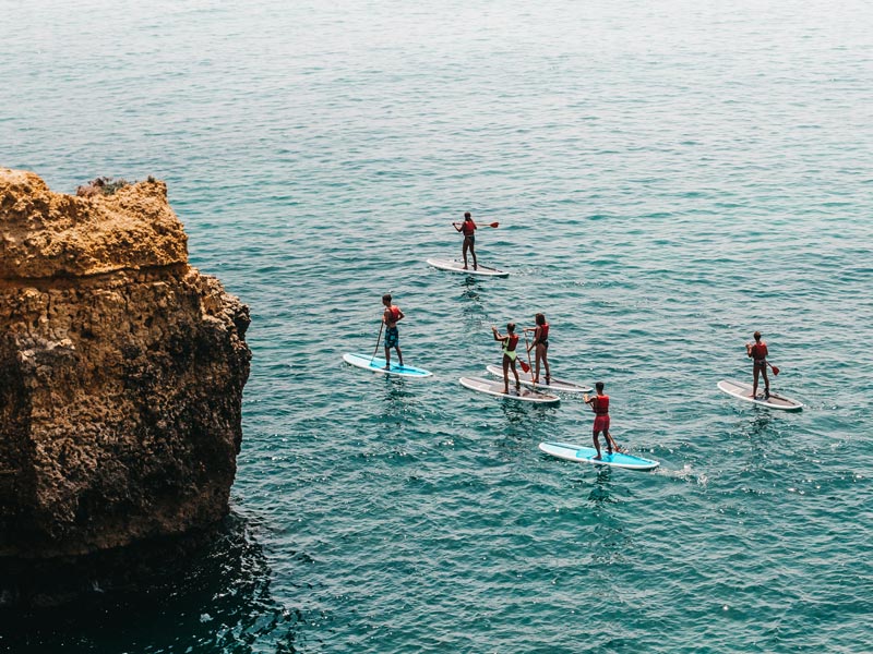 is paddle boarding dangerous? It is safer in a group.