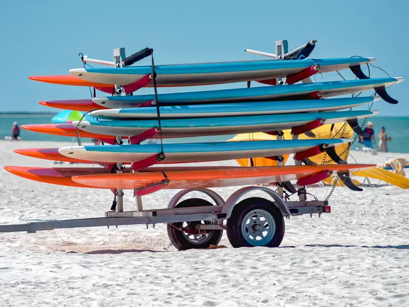 are inflatable boards any good? They are much easier to store. picture of paddle boards on a trailer on the beach