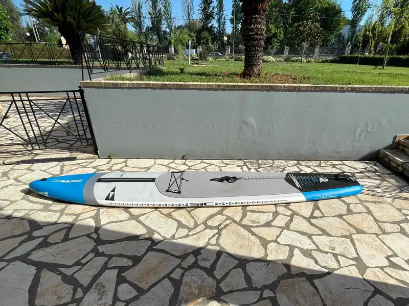 A paddle board deflating after opening the valve
